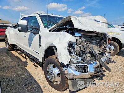 Czwarte zdjęcie samochodu z boku: 2021 FORD F350 SUPER DUTY VIN:1FT8W3DT6MED69400 - miniatura