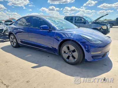 Czwarte zdjęcie samochodu z boku: 2023 TESLA MODEL 3 VIN:5YJ3E1EAXPF686842 - miniatura