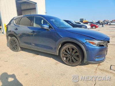Czwarte zdjęcie samochodu z boku: 2021 MAZDA CX-5 GRAND TOURING VIN:JM3KFBDM7M0389832 - miniatura