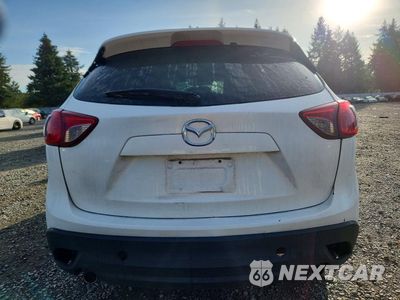 Zdjęcie 6 z 13 samochodu: 2014 MAZDA CX-5 TOURING VIN:JM3KE4CY3E0375933 - miniatura