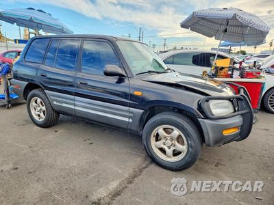 Czwarte zdjęcie samochodu z boku: 1997 TOYOTA RAV4 BASE VIN:JT3GP10V1V7012415 - miniatura