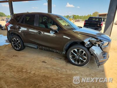 Czwarte zdjęcie samochodu z boku: 2016 MAZDA CX-5 GT VIN:JM3KE4DY3G0693309 - miniatura