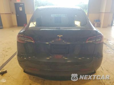 Zdjęcie 6 z 12 samochodu: 2024 TESLA MODEL Y VIN:7SAYGDED0RF003208 - miniatura