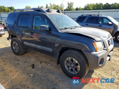 Czwarte zdjęcie samochodu z boku: 2015 NISSAN XTERRA PRO-4X VIN:5N1AN0NW3FN655330 - miniatura