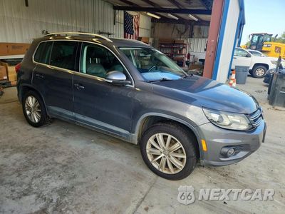Czwarte zdjęcie samochodu z boku: 2016 VOLKSWAGEN TIGUAN S VIN:WVGAV7AX4GW600274 - miniatura