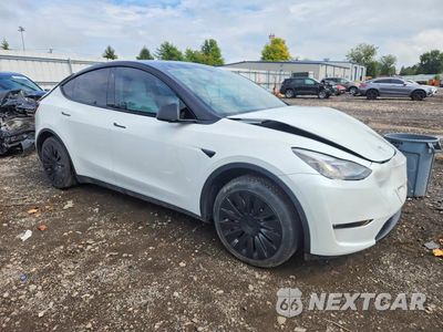 Czwarte zdjęcie samochodu z boku: 2023 TESLA MODEL Y VIN:7SAYGAEE9PF776974 - miniatura