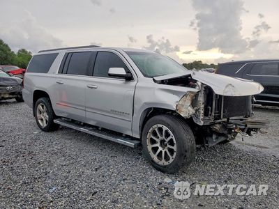 Czwarte zdjęcie samochodu z boku: 2019 CHEVROLET SUBURBAN K1500 LT VIN:1GNSKHKC3KR228511 - miniatura