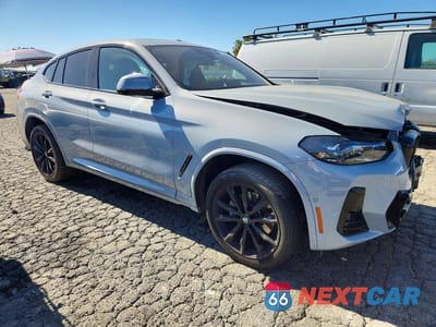 Czwarte zdjęcie samochodu z boku: 2024 BMW X4 XDRIVE30I VIN:5UX33DT06R9X04010 - miniatura