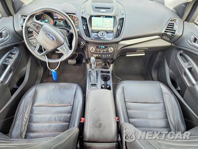 Zdjęcie 8 z 13 samochodu: 2017 FORD ESCAPE TITANIUM VIN:1FMCU0J98HUA75852 - miniatura