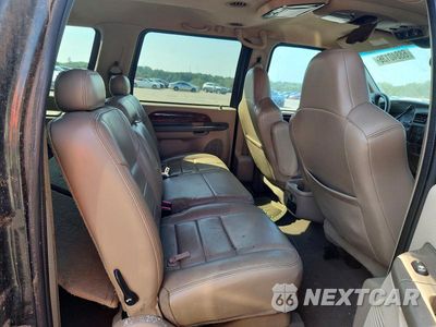 Zdjęcie 10 z 12 samochodu: 2002 FORD EXCURSION LIMITED VIN:1FMNU42L12EB24921 - miniatura
