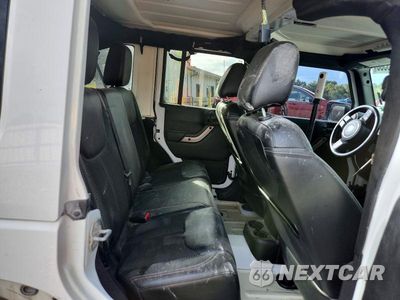 Zdjęcie 10 z 12 samochodu: 2016 JEEP WRANGLER UNLIMITED SAHARA VIN:1C4BJWEG2GL245129 - miniatura