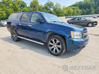 Czwarte zdjęcie samochodu z boku: 2007 CHEVROLET SUBURBAN K1500 VIN:1GNFK16367J179068 - miniatura