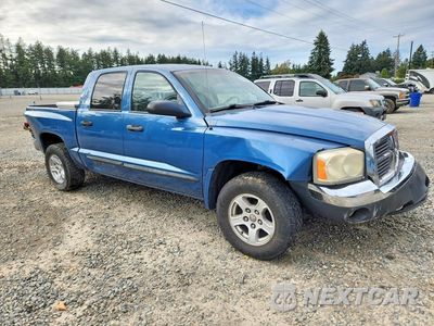 Czwarte zdjęcie samochodu z boku: 2005 DODGE DAKOTA QUAD SLT VIN:1D7HE48N25S209687 - miniatura