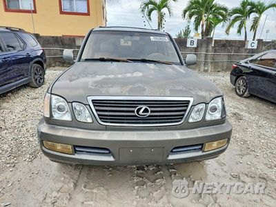 Piąte zdjęcie samochodu w środku: 1999 LEXUS LX 470 VIN:JT6HT00W2X0039480 - miniatura