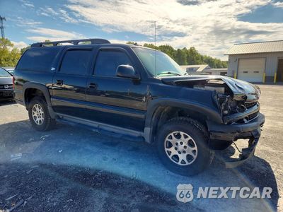 Czwarte zdjęcie samochodu z boku: 2003 CHEVROLET SUBURBAN K1500 VIN:1GNFK16Z63R202851 - miniatura