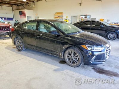 Czwarte zdjęcie samochodu z boku: 2018 HYUNDAI ELANTRA VALUE EDITION VIN:5NPD84LF7JH397258 - miniatura