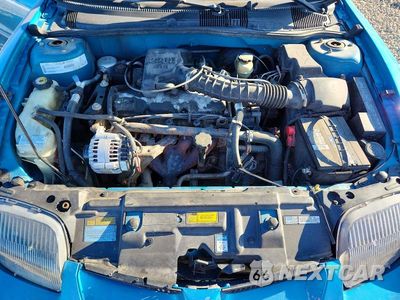 Zdjęcie 11 z 12 samochodu: 2000 PONTIAC SUNFIRE SE VIN:1G2JB5245Y7219734 - miniatura