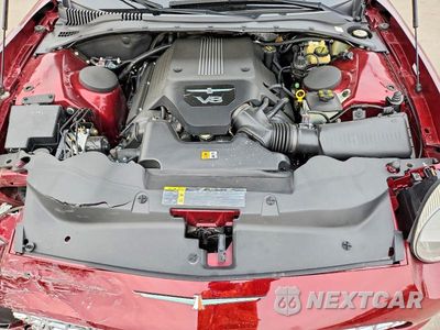 Zdjęcie 11 z 13 samochodu: 2004 FORD THUNDERBIRD VIN:1FAHP60A34Y102416 - miniatura