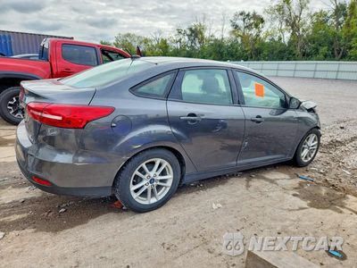 Trzecie zdjęcie samochodu z tyłu: 2016 FORD FOCUS SE VIN:1FADP3F24GL397668 - miniatura
