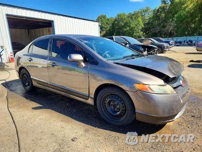Czwarte zdjęcie samochodu z boku: 2009 HONDA CIVIC LX VIN:2HGFA16579H530900 - miniatura