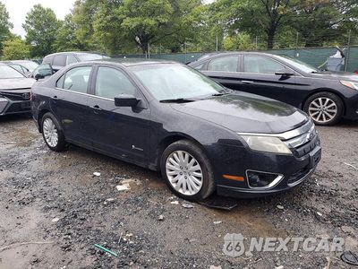 Czwarte zdjęcie samochodu z boku: 2010 FORD FUSION HYBRID VIN:3FADP0L39AR176894 - miniatura