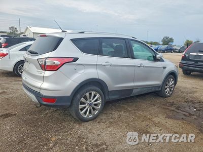 Trzecie zdjęcie samochodu z tyłu: 2017 FORD ESCAPE TITANIUM VIN:1FMCU9JD8HUB93831 - miniatura
