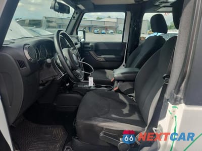 Zdjęcie 7 z 13 samochodu: 2016 JEEP WRANGLER SPORT VIN:1C4AJWAG0GL119465 - miniatura