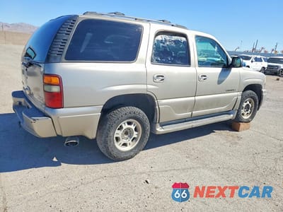 Trzecie zdjęcie samochodu z tyłu: 2003 GMC YUKON DENALI VIN:1GKEK63U73J172336 - miniatura