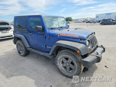 Czwarte zdjęcie samochodu z boku: 2010 JEEP WRANGLER SPORT VIN:1J4AA2D1XAL205383 - miniatura