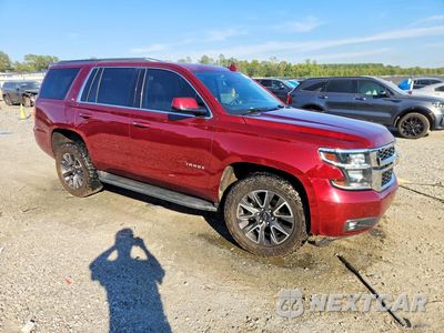 Czwarte zdjęcie samochodu z boku: 2019 CHEVROLET TAHOE C1500 LT VIN:1GNSCBKC9KR292725 - miniatura