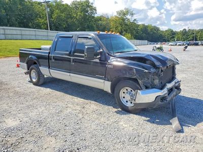 Czwarte zdjęcie samochodu z boku: 2002 FORD F250 SUPER DUTY VIN:3FTNW20F92MA07212 - miniatura