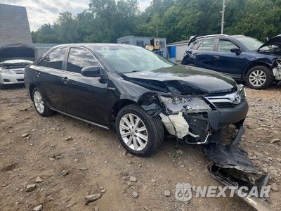 Czwarte zdjęcie samochodu z boku: 2012 TOYOTA CAMRY HYBRID XLE VIN:4T1BD1FK0CU008863 - miniatura