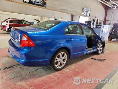 Trzecie zdjęcie samochodu z tyłu: 2012 FORD FUSION SE VIN:3FAHP0HA9CR299977 - miniatura