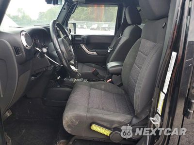 Zdjęcie 7 z 12 samochodu: 2012 JEEP WRANGLER UNLIMITED SAHARA VIN:1C4HJWEG8CL104473 - miniatura