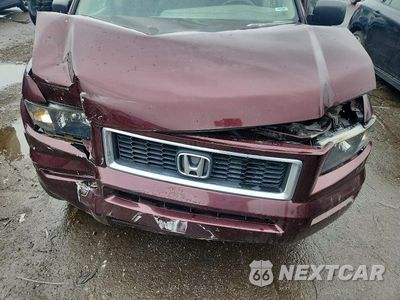 Zdjęcie 11 z 12 samochodu: 2007 HONDA RIDGELINE RTX VIN:2HJYK16307H527672 - miniatura