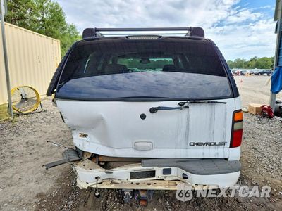 Zdjęcie 6 z 13 samochodu: 2001 CHEVROLET TAHOE C1500 VIN:1GNEC13T11J313439 - miniatura