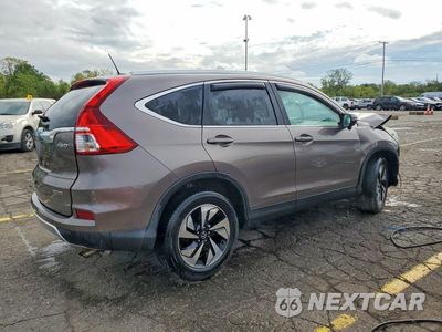 Trzecie zdjęcie samochodu z tyłu: 2016 HONDA CR-V TOURING VIN:5J6RM4H9XGL006249 - miniatura