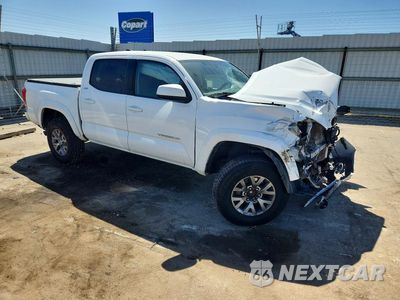 Czwarte zdjęcie samochodu z boku: 2016 TOYOTA TACOMA SR5 V6 VIN:3TMAZ5CN2GM004136 - miniatura