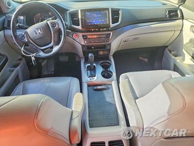 Zdjęcie 8 z 14 samochodu: 2017 HONDA PILOT EXL VIN:5FNYF5H59HB025538 - miniatura
