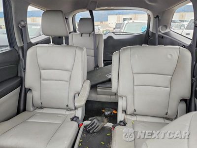 Zdjęcie 10 z 13 samochodu: 2021 HONDA PILOT TOURING VIN:5FNYF5H66MB000437 - miniatura