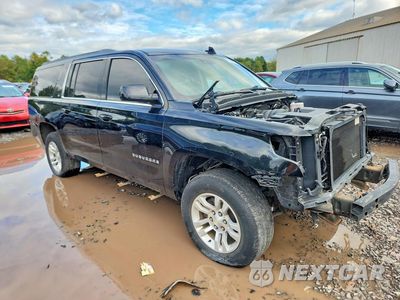 Czwarte zdjęcie samochodu z boku: 2017 CHEVROLET SUBURBAN K1500 LT VIN:1GNSKHKC0HR277111 - miniatura