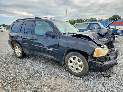 Czwarte zdjęcie samochodu z boku: 2003 GMC ENVOY VIN:1GKDS13S932365997 - miniatura