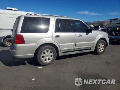 Trzecie zdjęcie samochodu z tyłu: 2003 LINCOLN NAVIGATOR VIN:5LMFU27R23LJ38679 - miniatura