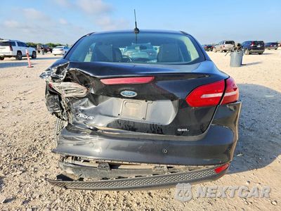 Zdjęcie 6 z 13 samochodu: 2017 FORD FOCUS SEL VIN:1FADP3H29HL204607 - miniatura