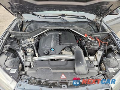 Zdjęcie 12 z 13 samochodu: 2014 BMW X5 XDRIVE35I VIN:5UXKR0C59E0C26469 - miniatura