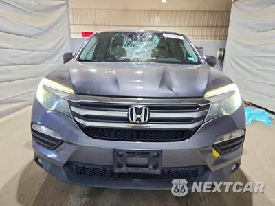 Piąte zdjęcie samochodu w środku: 2016 HONDA PILOT EXL VIN:5FNYF6H55GB127729 - miniatura