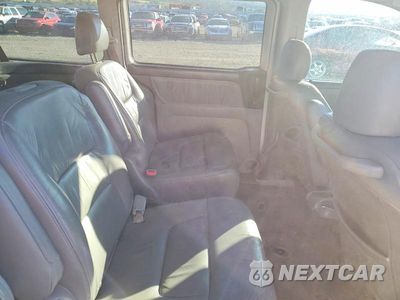 Zdjęcie 11 z 13 samochodu: 2004 HONDA ODYSSEY EXL VIN:5FNRL18084B106888 - miniatura