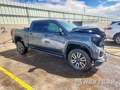 Czwarte zdjęcie samochodu z boku: 2021 GMC SIERRA K1500 AT4 VIN:1GTP9EEL4MZ434167 - miniatura
