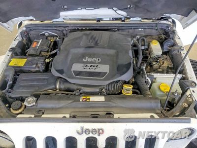 Zdjęcie 11 z 12 samochodu: 2013 JEEP WRANGLER UNLIMITED SAHARA VIN:1C4BJWEG2DL567846 - miniatura