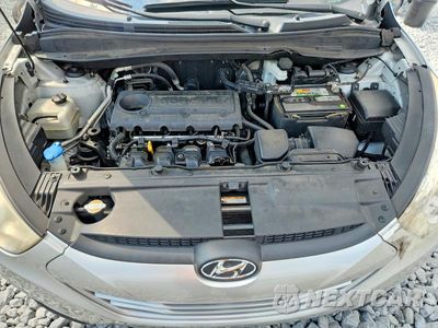 Zdjęcie 12 z 13 samochodu: 2011 HYUNDAI TUCSON GLS VIN:KM8JU3AC7BU300659 - miniatura